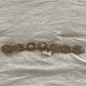 Never used beaded jeweled belt, snap closure